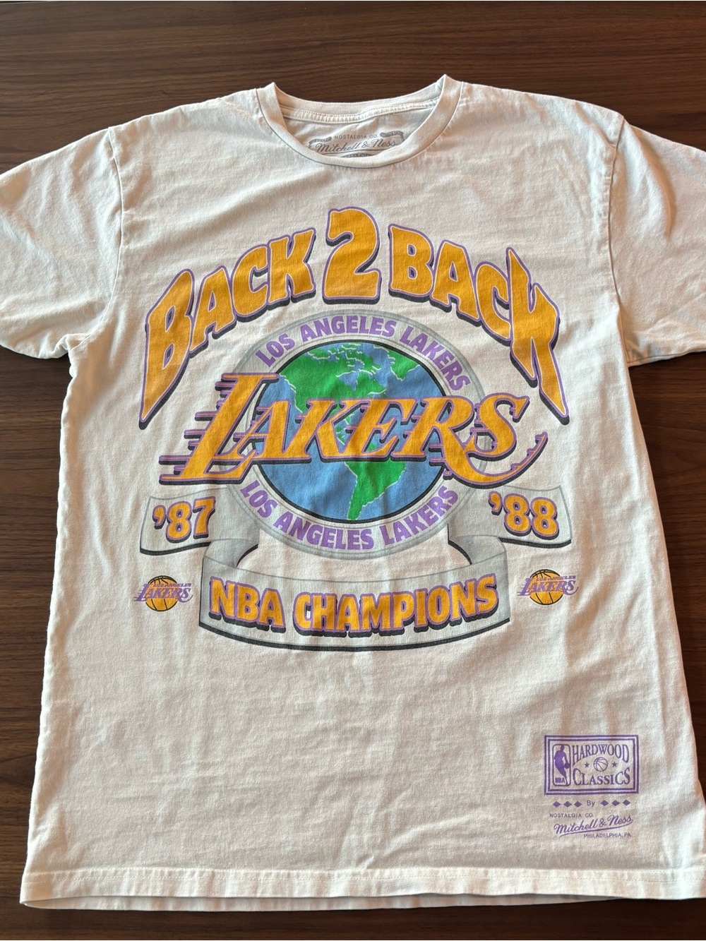 Mitchell & Ness Cream T-Shirt with Purple & Gold Graphic Lakers